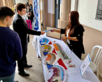 Migraciones estuvo presente con mesa de informaciones en la Feria de Cultura de la UC